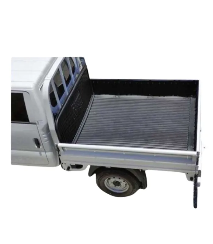 Protector de cama (bed liner) modular de alta resistencia instalado en un camión Kia K2700