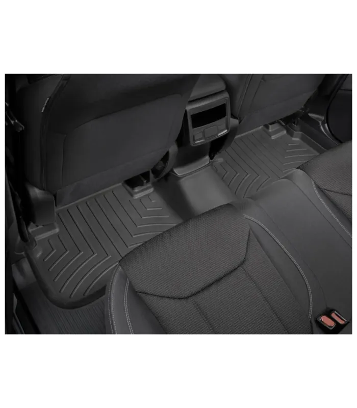 Alfombra de la segunda fila WeatherTech cubriendo completamente el piso de un Subaru Forester
